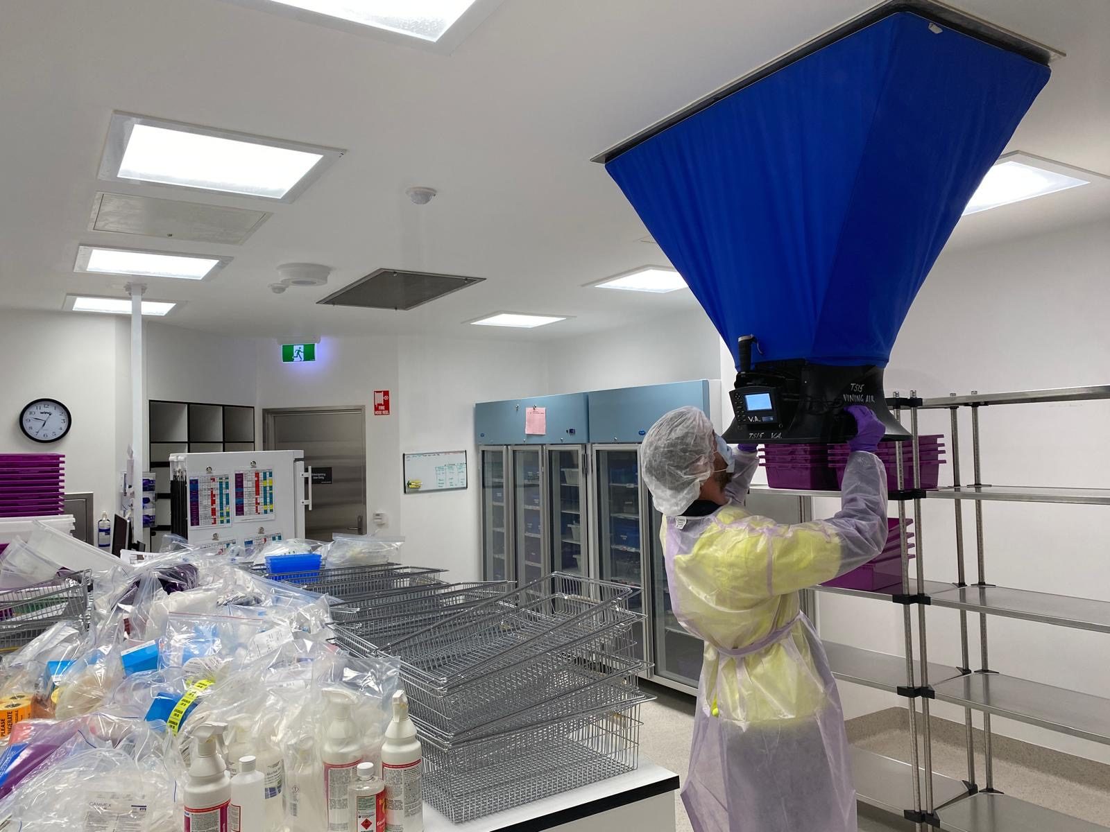 Air balance testing of a cleanroom supply diffuser with a flow hood