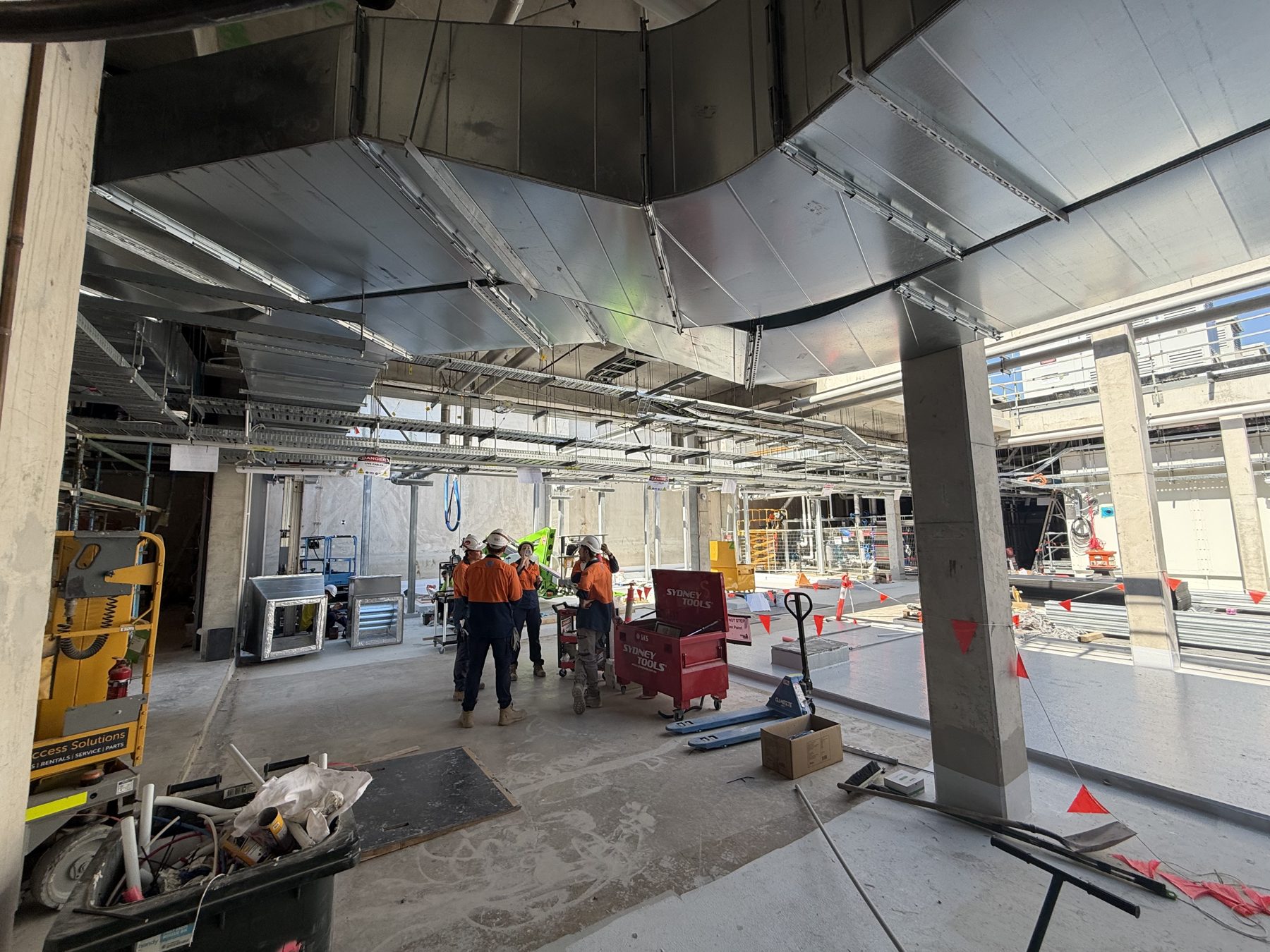 Spiral and rectangular ductwork installation on a commercial fitout